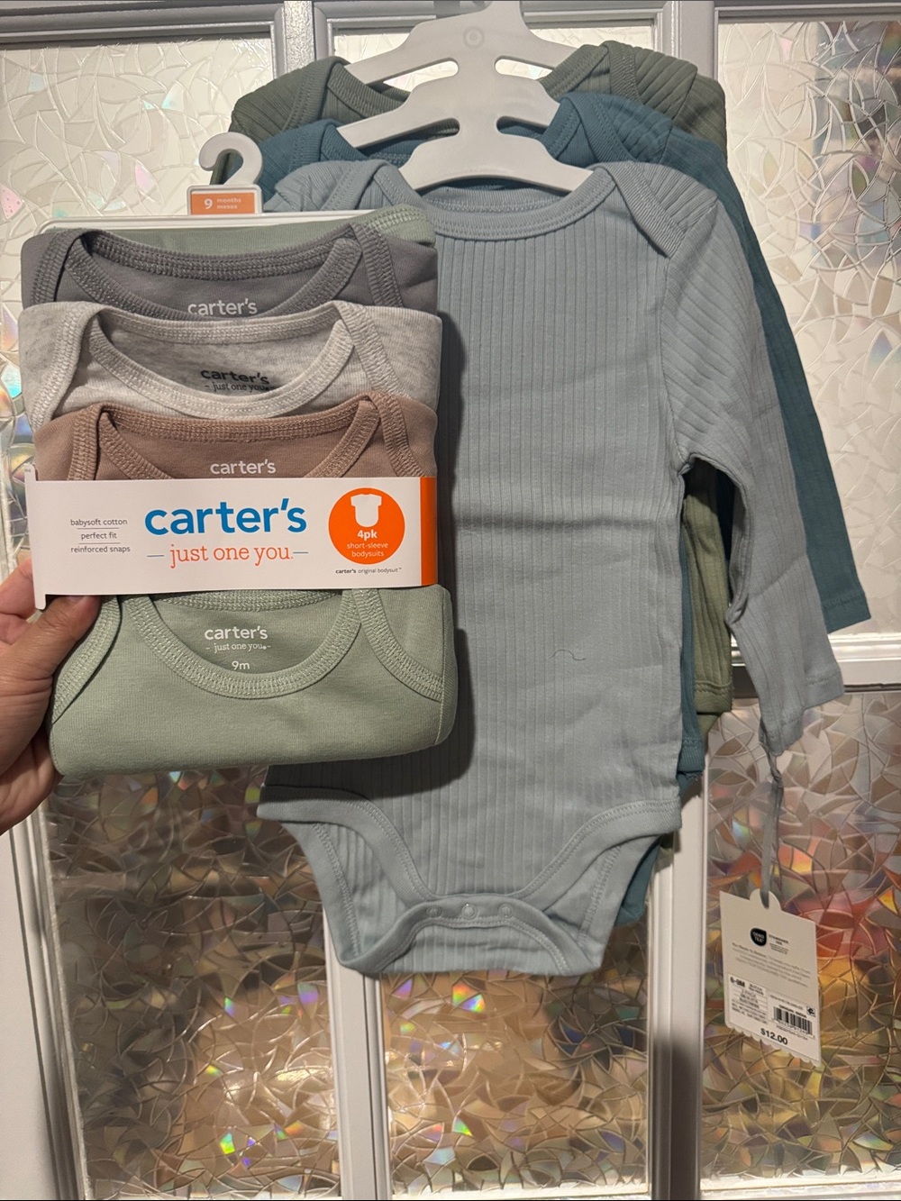 3pk Carters 6-9M onesie and 4pk Carters 9M short sleeve bodysuit
